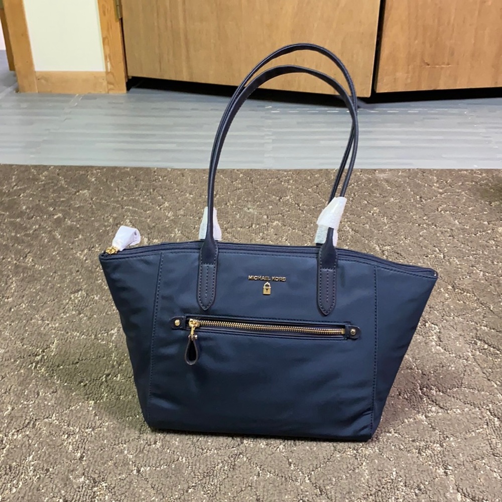 Navy blue Michael Kors pocket book